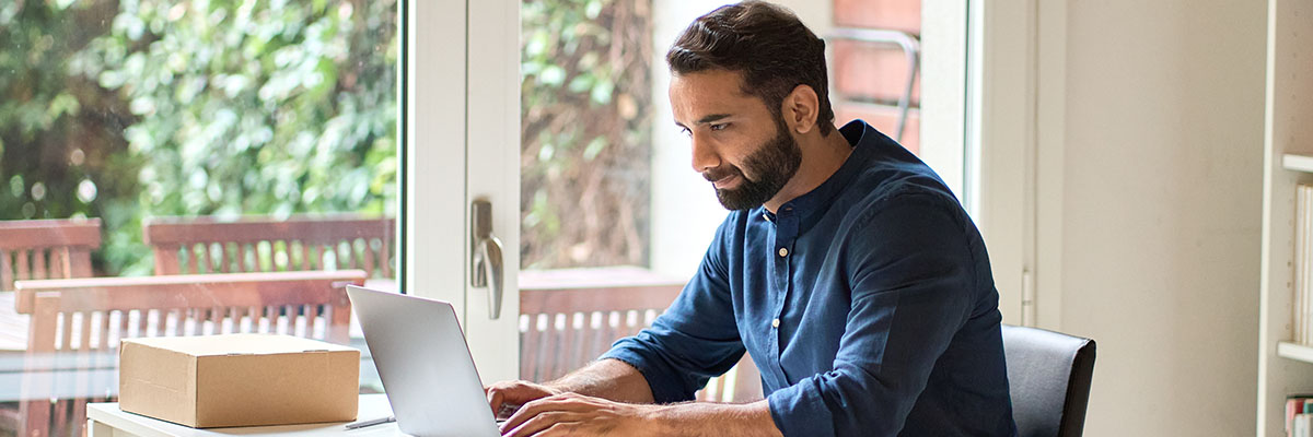 person looking at laptop