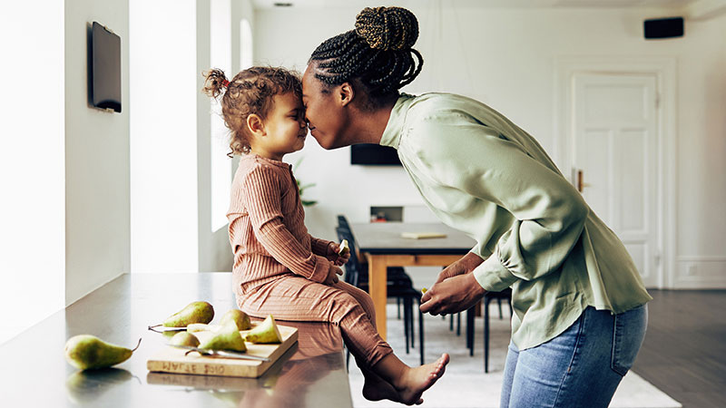lady with child in kitchen